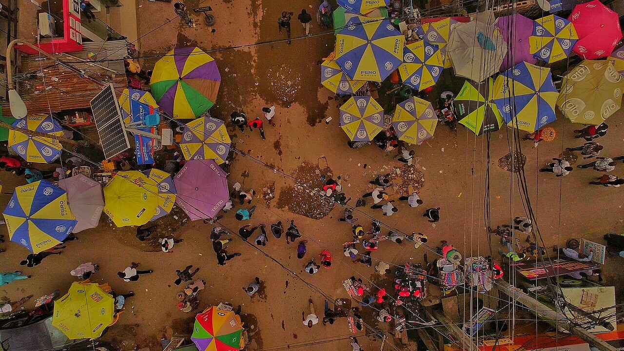 An overhead view of Computer Village in Ikeja, Lagos. File photograph of an urban community, not a project-monitoring system.