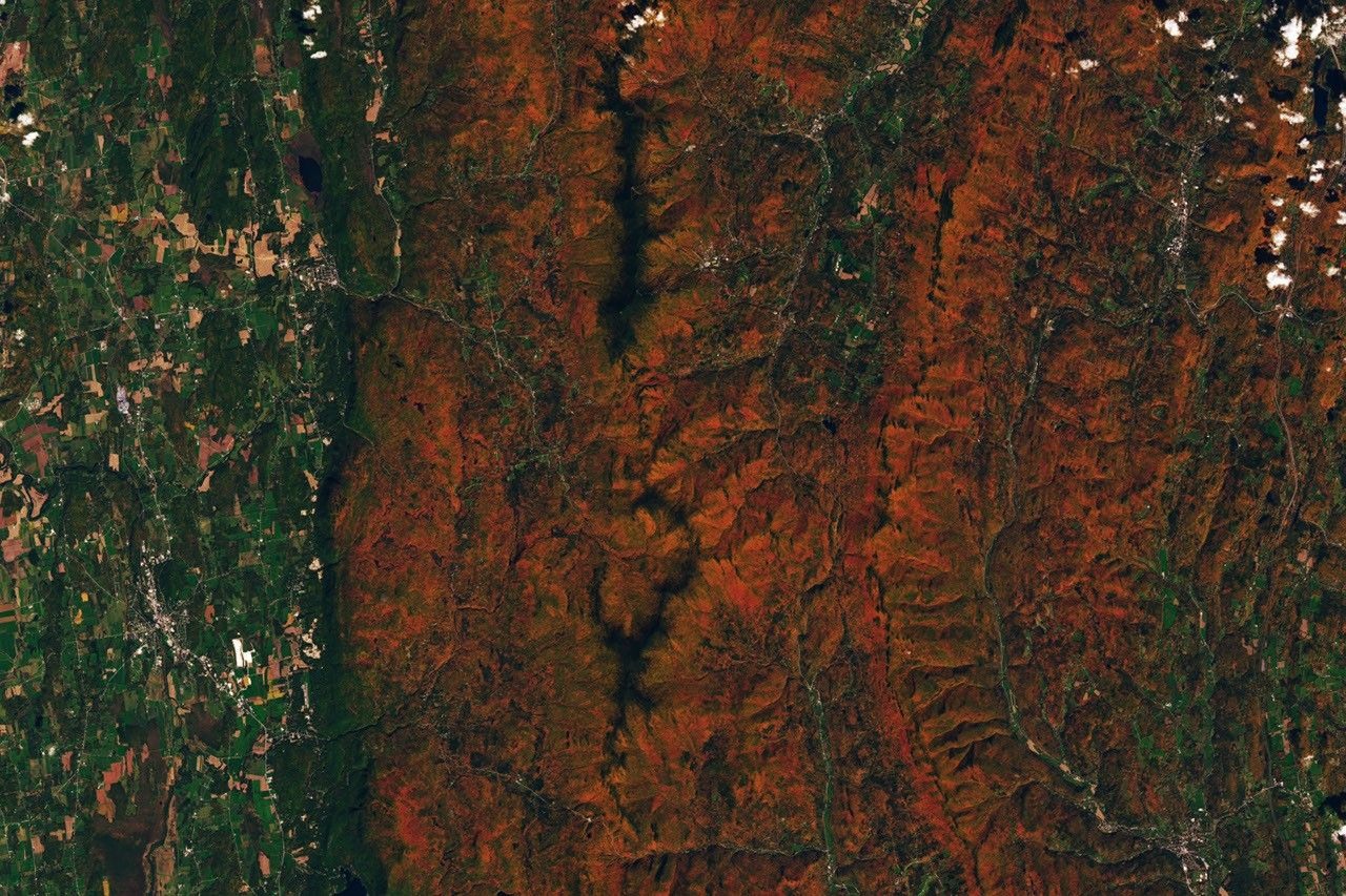 Landsat 9 image of autumn-coloured ridges near Ripton, Vermont, on October 3, 2026. NASA Earth Observatory/Lauren Dauphin; this is a satellite view, not a ground photograph.