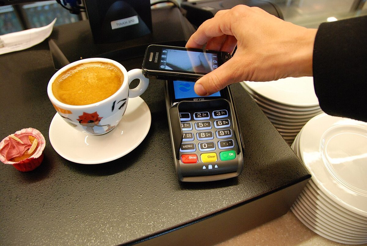 A mobile contactless payment. File photograph illustrating the checkout process; not a Google Wallet launch image.